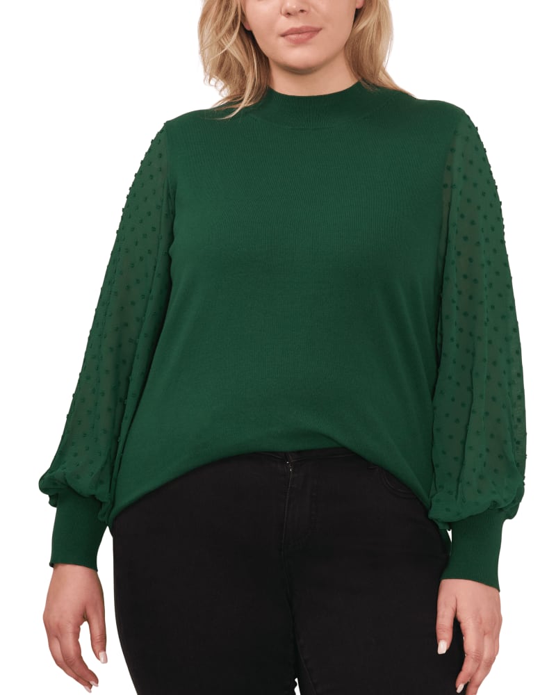 Front of a model wearing a size 1X Tori Mock Neck Sweater in Alpine Green by CeCe. | dia_product_style_image_id:263501